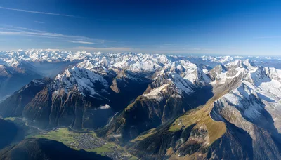 Aerial View of the Swiss Alps and Valley Town