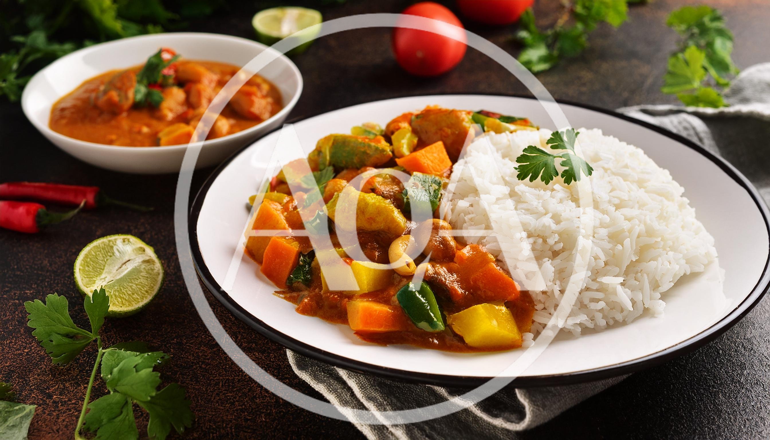 Vegetable Curry With Steamed Rice On A Plate