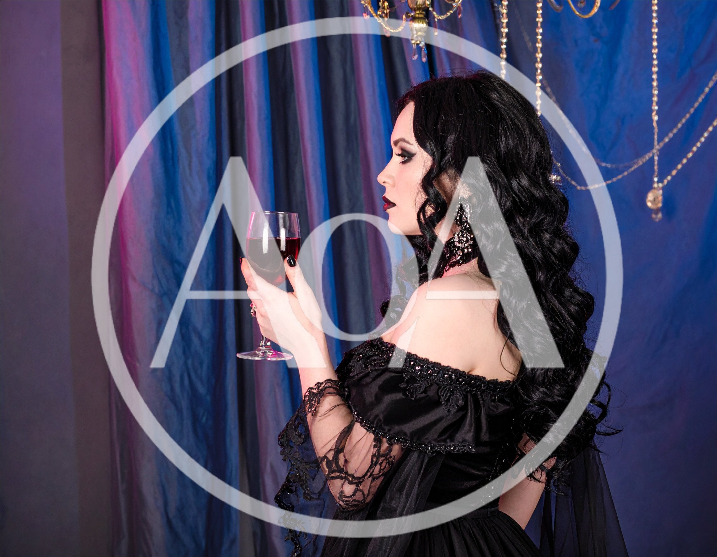 Gothic Woman Holding A Glass Of Red Wine