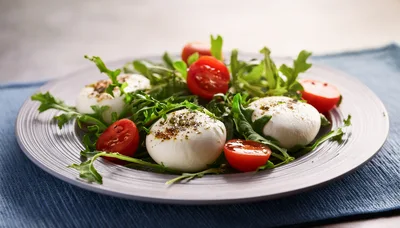 Fresh Burrata Cheese Salad With Arugula And Tomatoes
