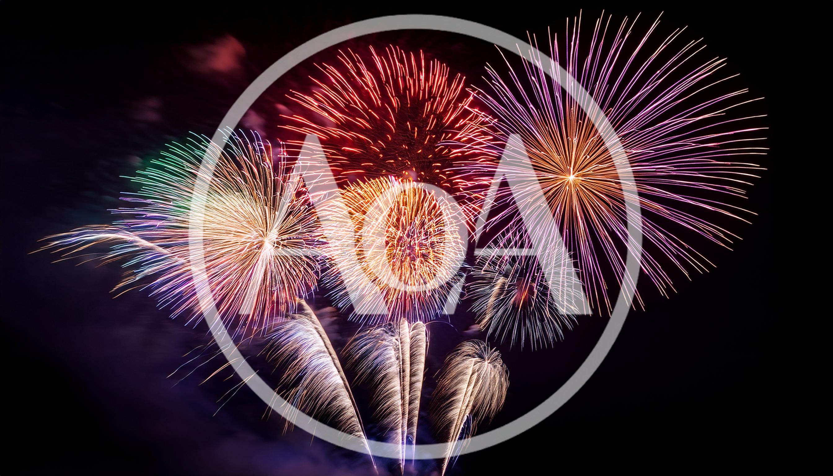 Vibrant Multi-Colored Fireworks Display In Night Sky