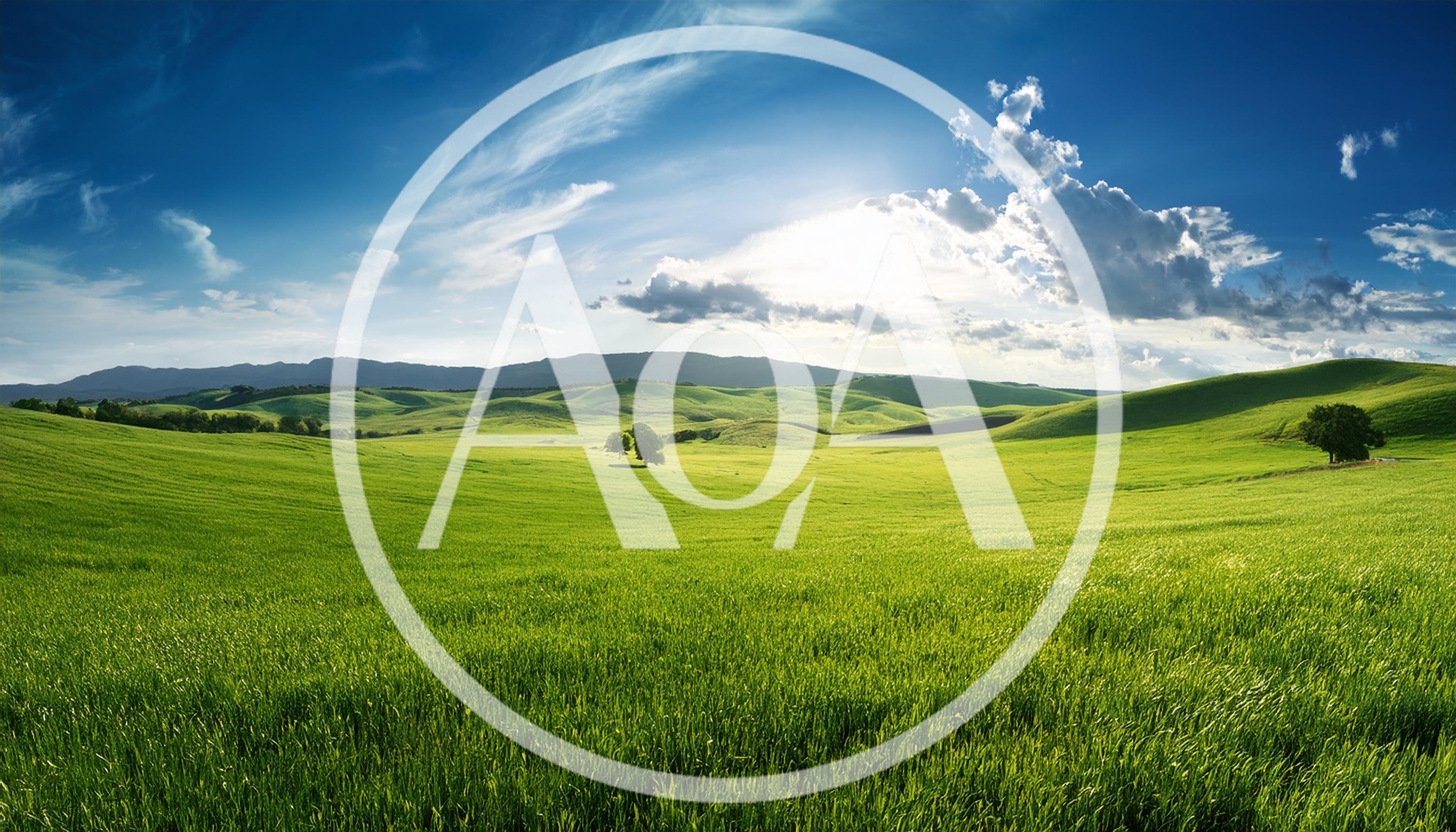 Rolling Green Hills Under A Bright Sunny Sky