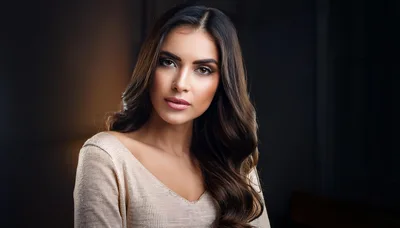 Portrait Of A Beautiful Young Woman With Wavy Hair