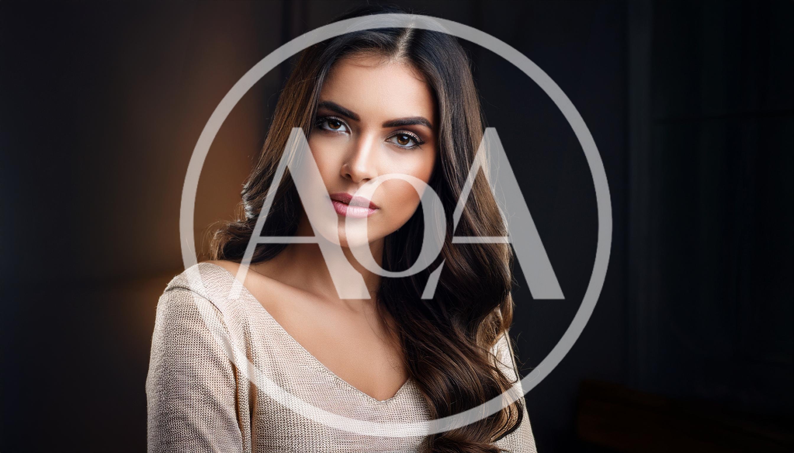 Portrait Of A Beautiful Young Woman With Wavy Hair