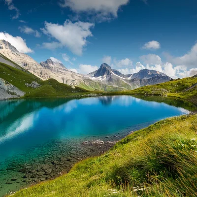 Alpine Lake With Turquoise Water And Mountain Peaks