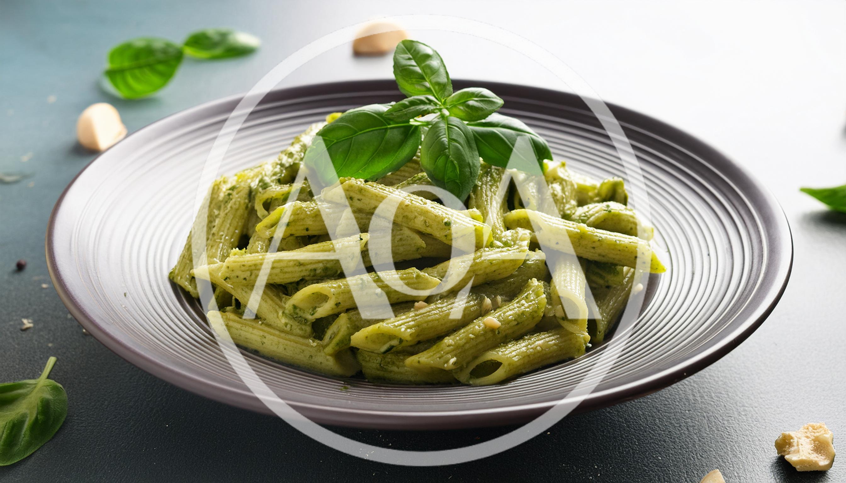 Penne Pasta With Pesto Sauce On A Plate