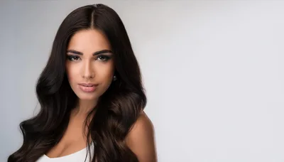 Portrait Of A Beautiful Woman With Long Wavy Hair