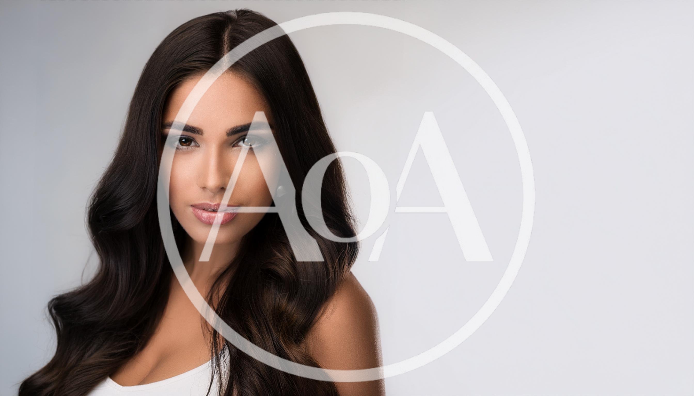 Portrait Of A Beautiful Woman With Long Wavy Hair