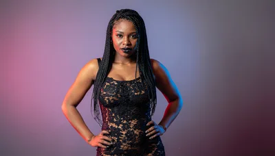 Portrait Of A Confident Woman With Braided Hair