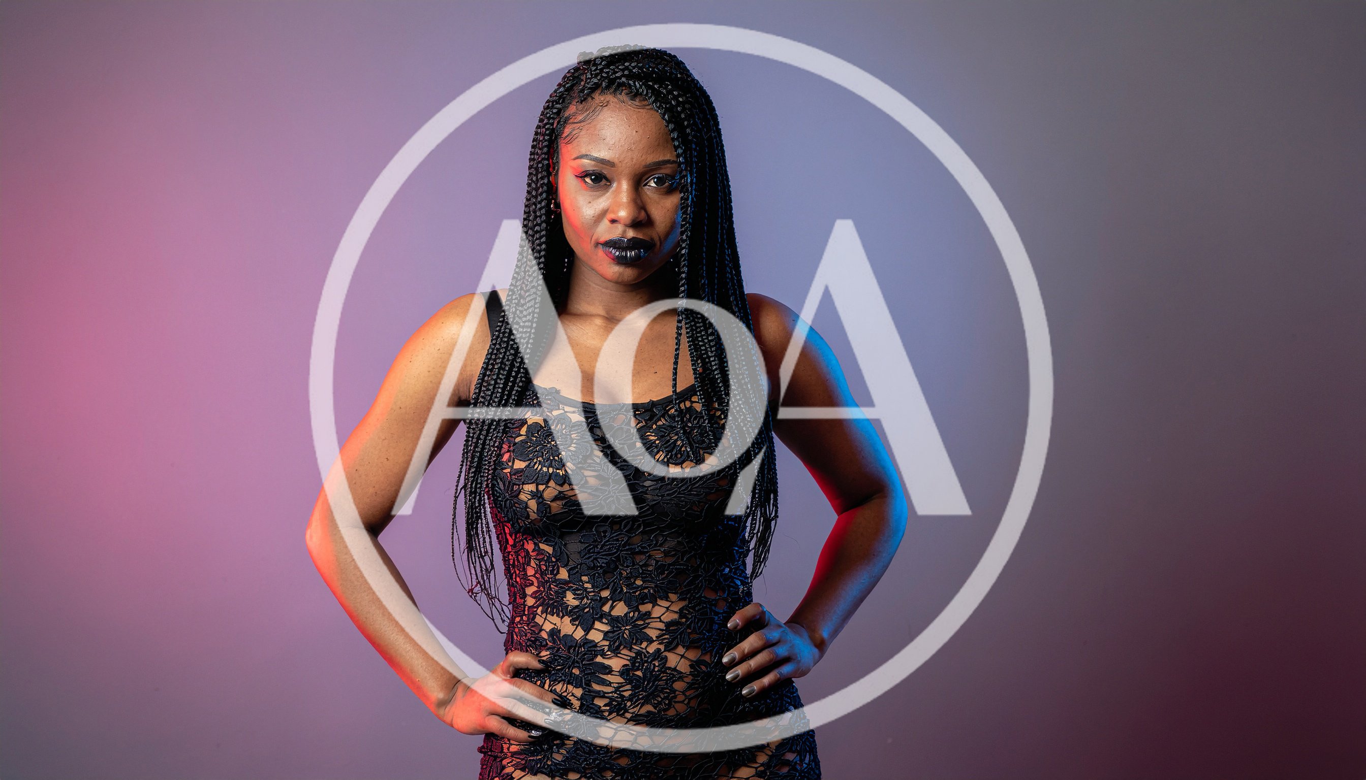 Portrait Of A Confident Woman With Braided Hair