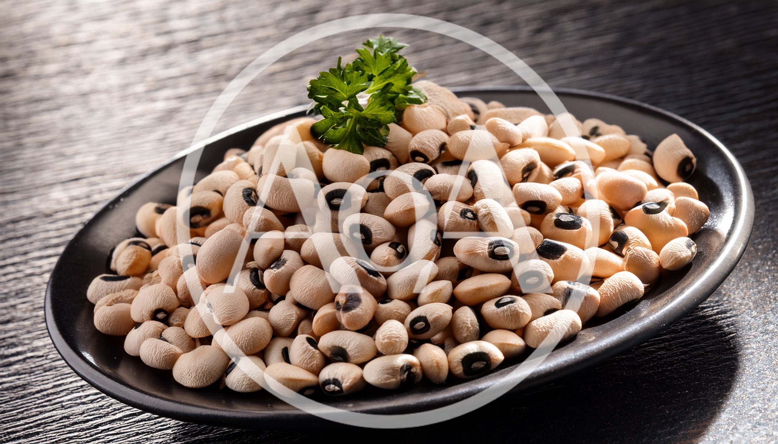 Black Eyed Peas Served On A Black Plate