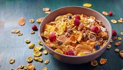 Bowl of Crunchy Breakfast Cereal with Fresh Berries
