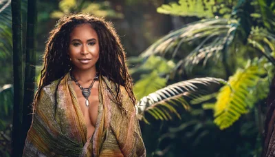 Portrait Of A Woman With Dreadlocks In A Tropical Forest