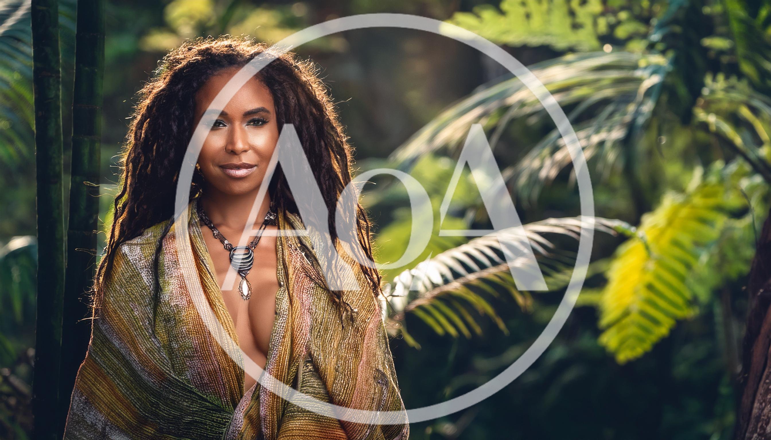 Portrait Of A Woman With Dreadlocks In A Tropical Forest