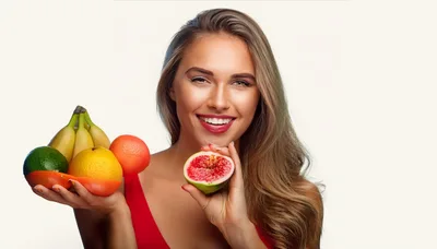 Smiling Woman Holding Fresh Fruits And A Fig