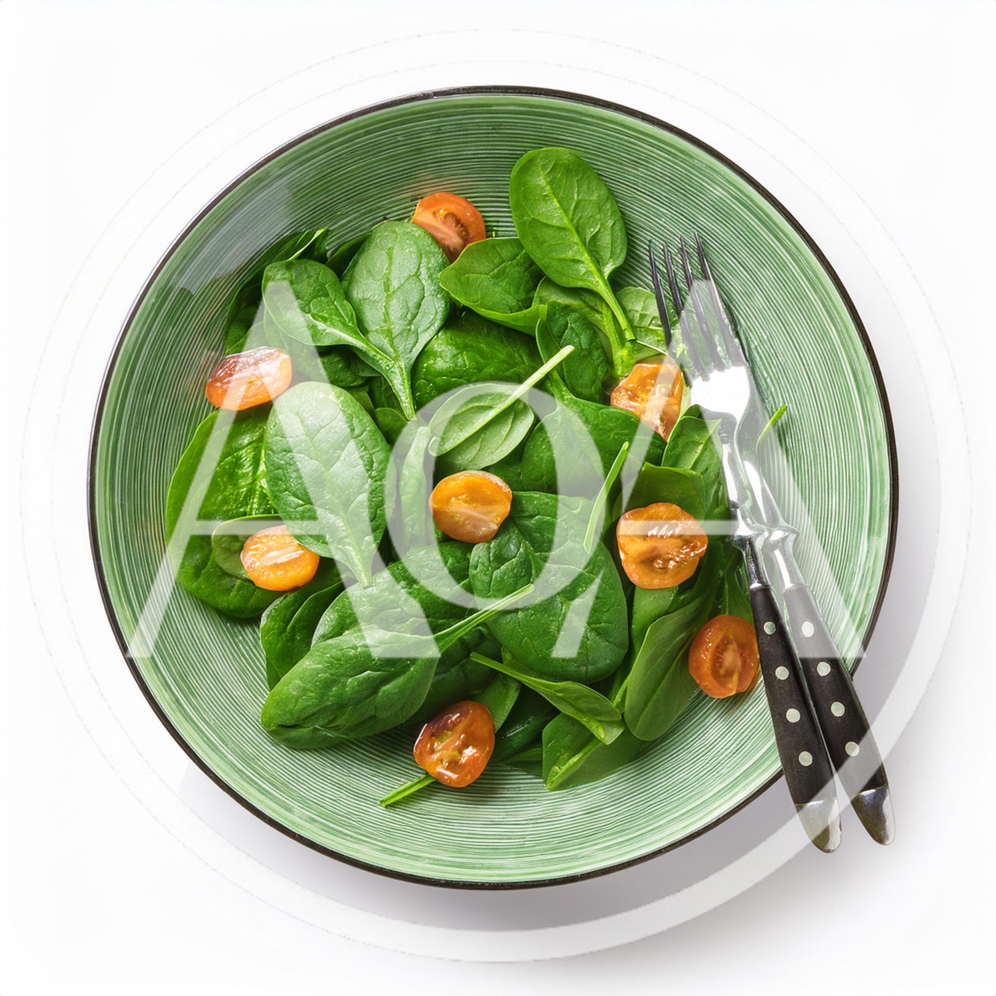 Fresh Spinach Salad With Cherry Tomatoes In Green Bowl
