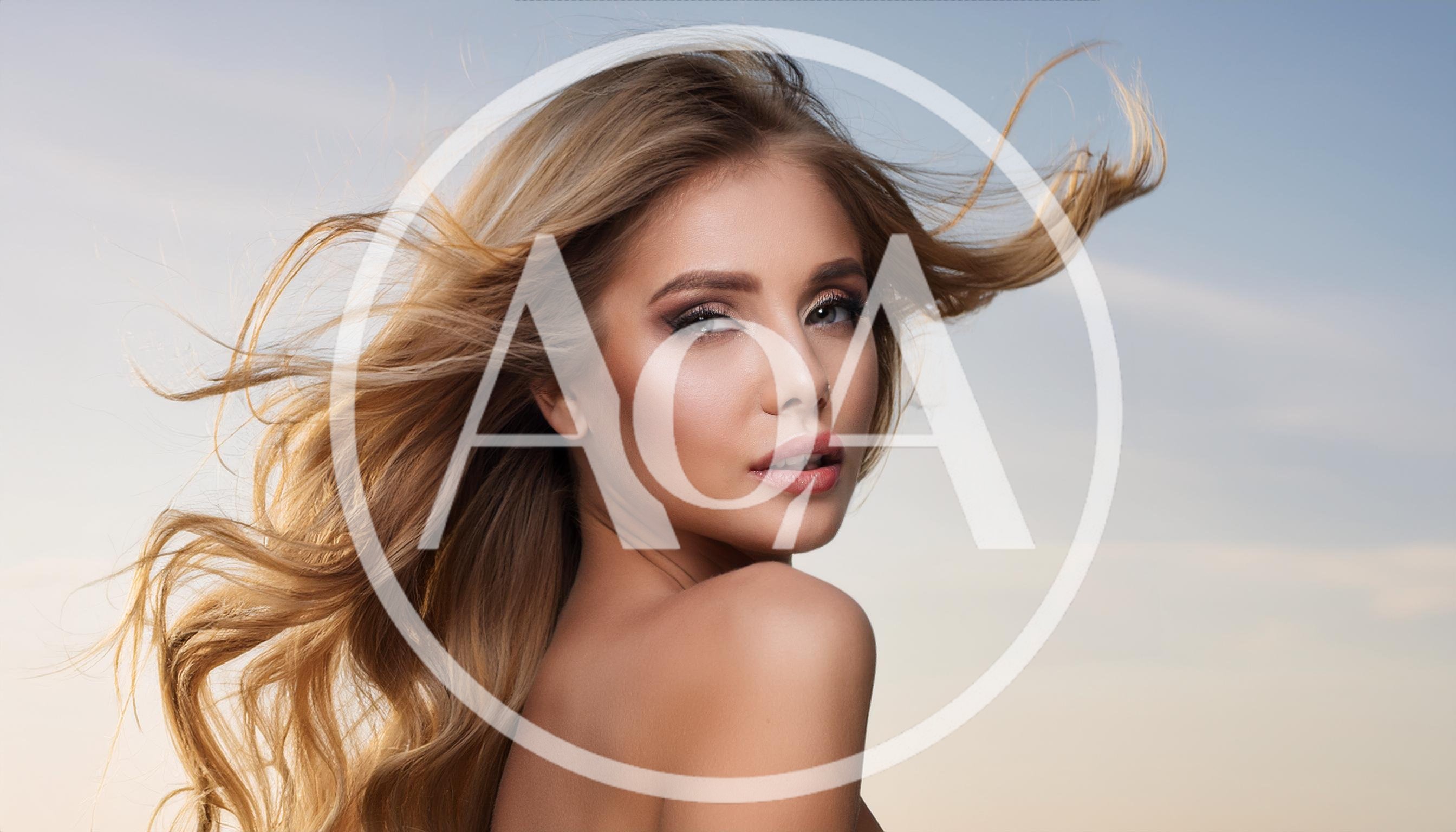 Portrait Of A Beautiful Blonde Woman With Flowing Hair