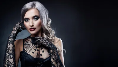 Elegant Woman With Blonde Hair Wearing Black Lace Gloves