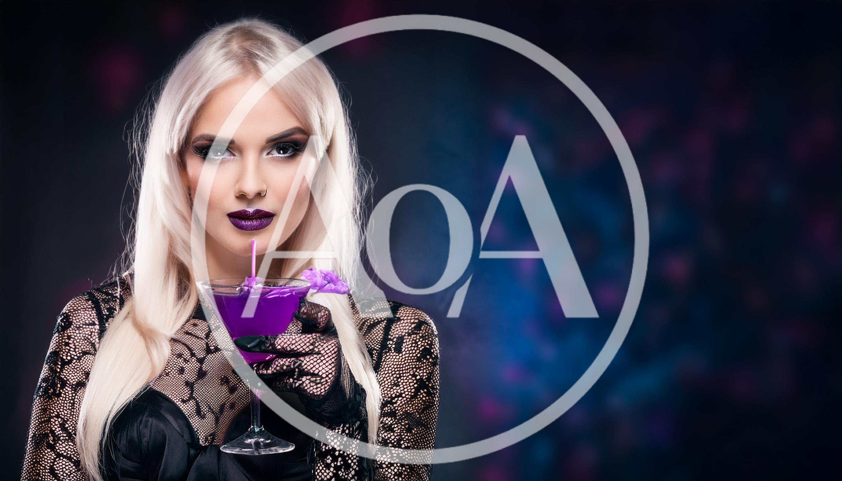 Blonde Woman Holding A Purple Cocktail In Lace Gloves