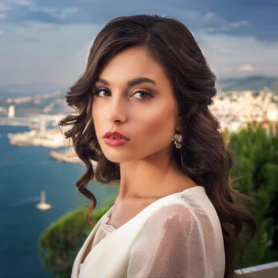 Portrait Of A Beautiful Woman Overlooking The Sea