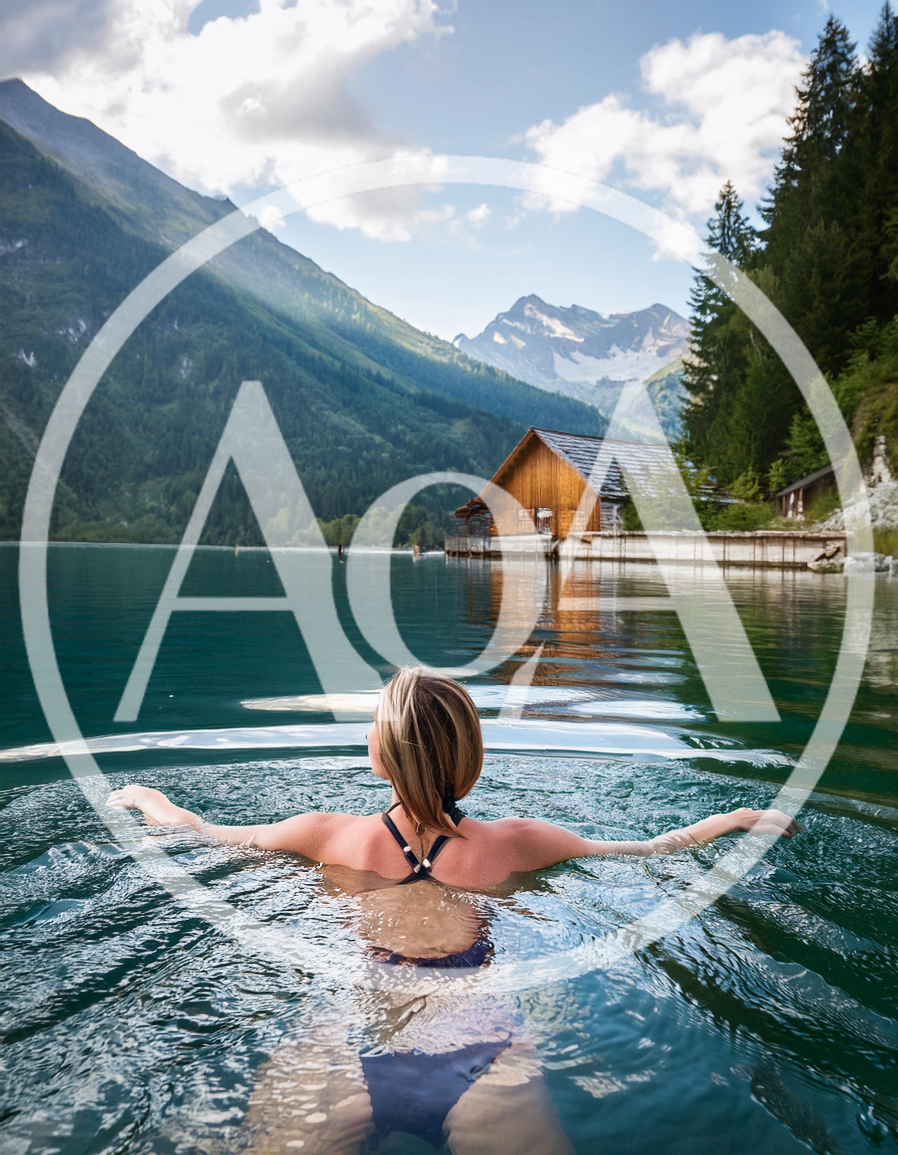 Woman Swimming In A Scenic Alpine Lake