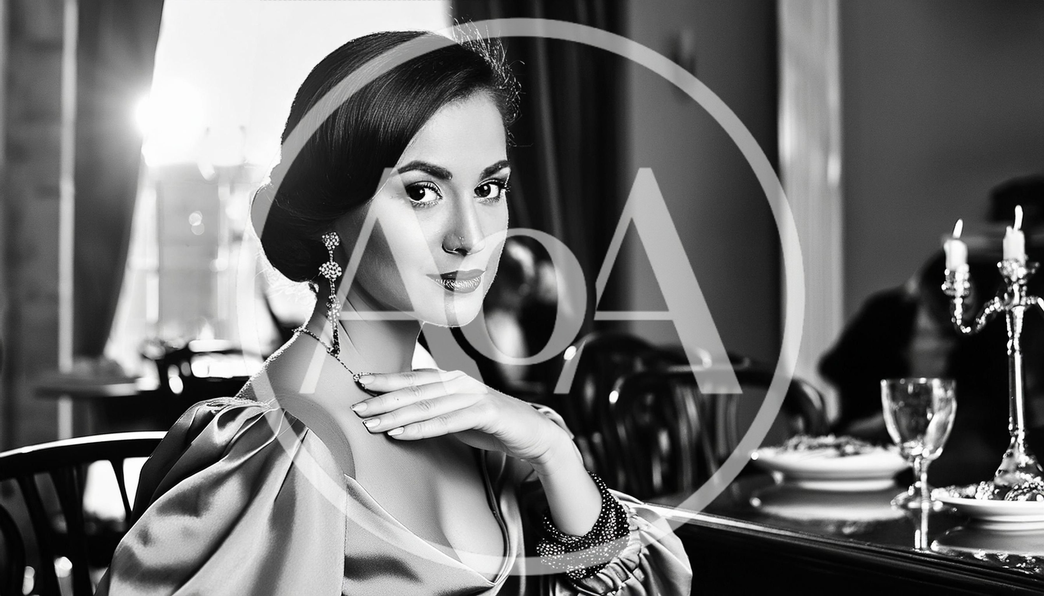 Elegant Woman Sitting At A Restaurant Table