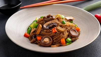 Stir Fried Glass Noodles With Mushrooms And Vegetables
