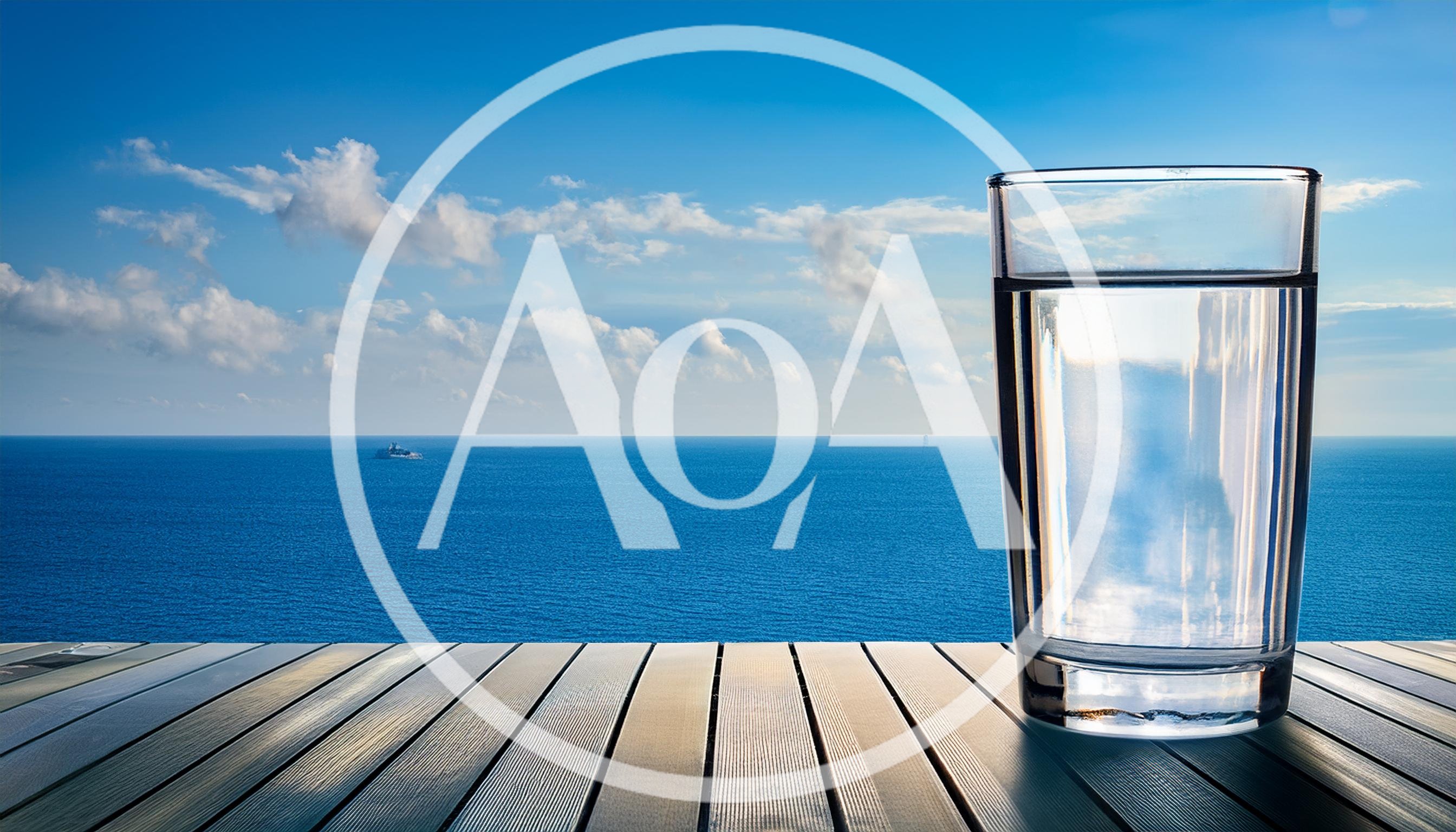 Glass Of Water On A Wooden Deck Overlooking The Ocean