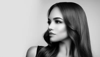 Portrait Of A Beautiful Woman With Long Wavy Hair