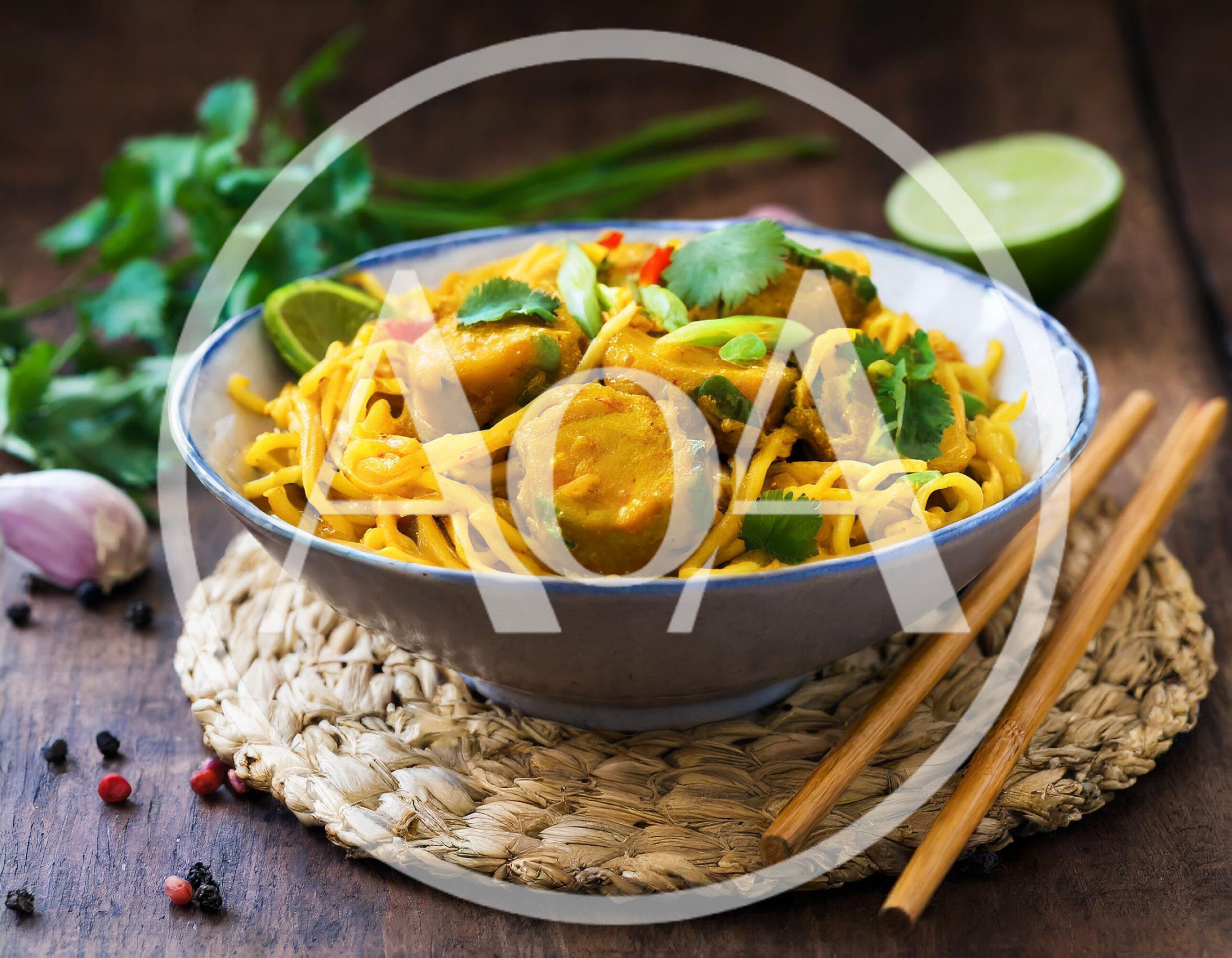 Bowl Of Yellow Curry Noodles With Vegetables