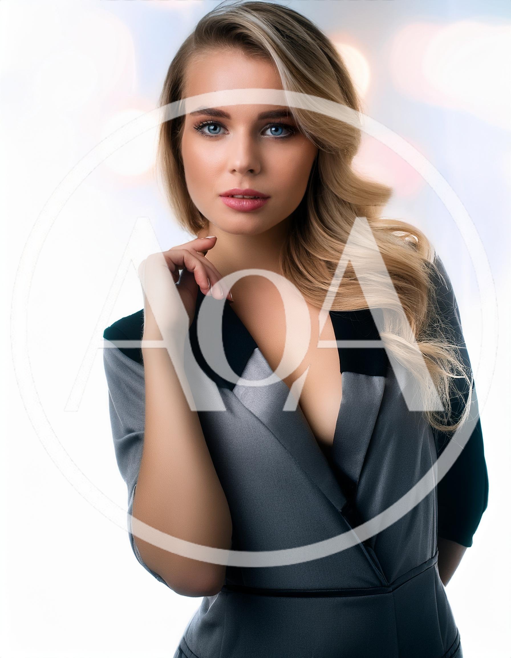 Portrait Of A Beautiful Blonde Woman In A Blazer