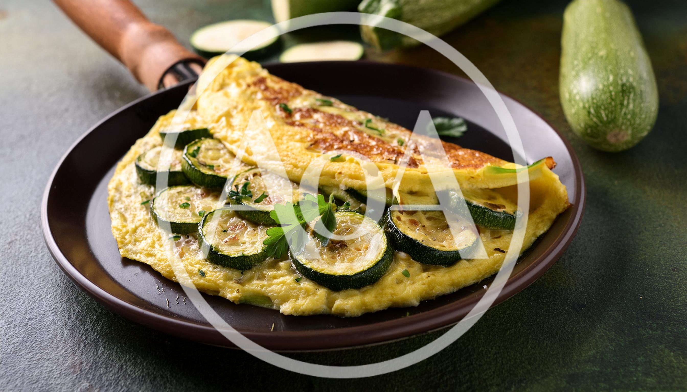 Zucchini Omelet Served In A Frying Pan