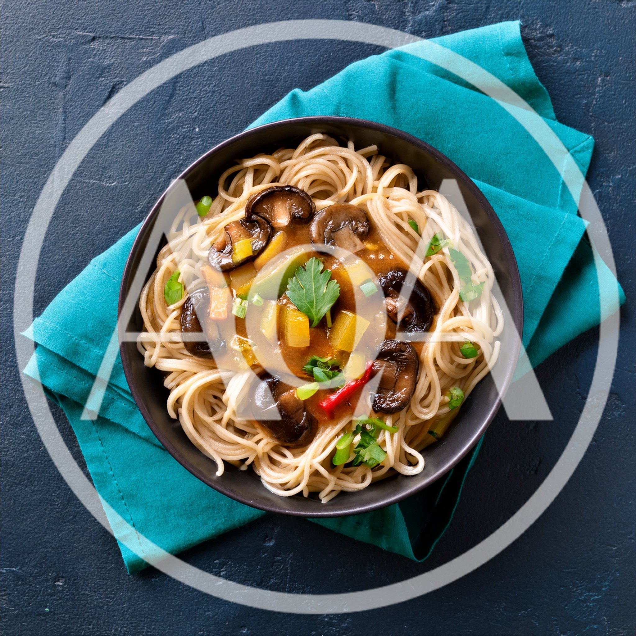 Bowl Of Stir Fried Noodles With Mushrooms And Vegetables