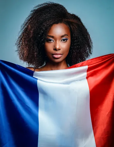 Young Black Woman Holding A French Flag