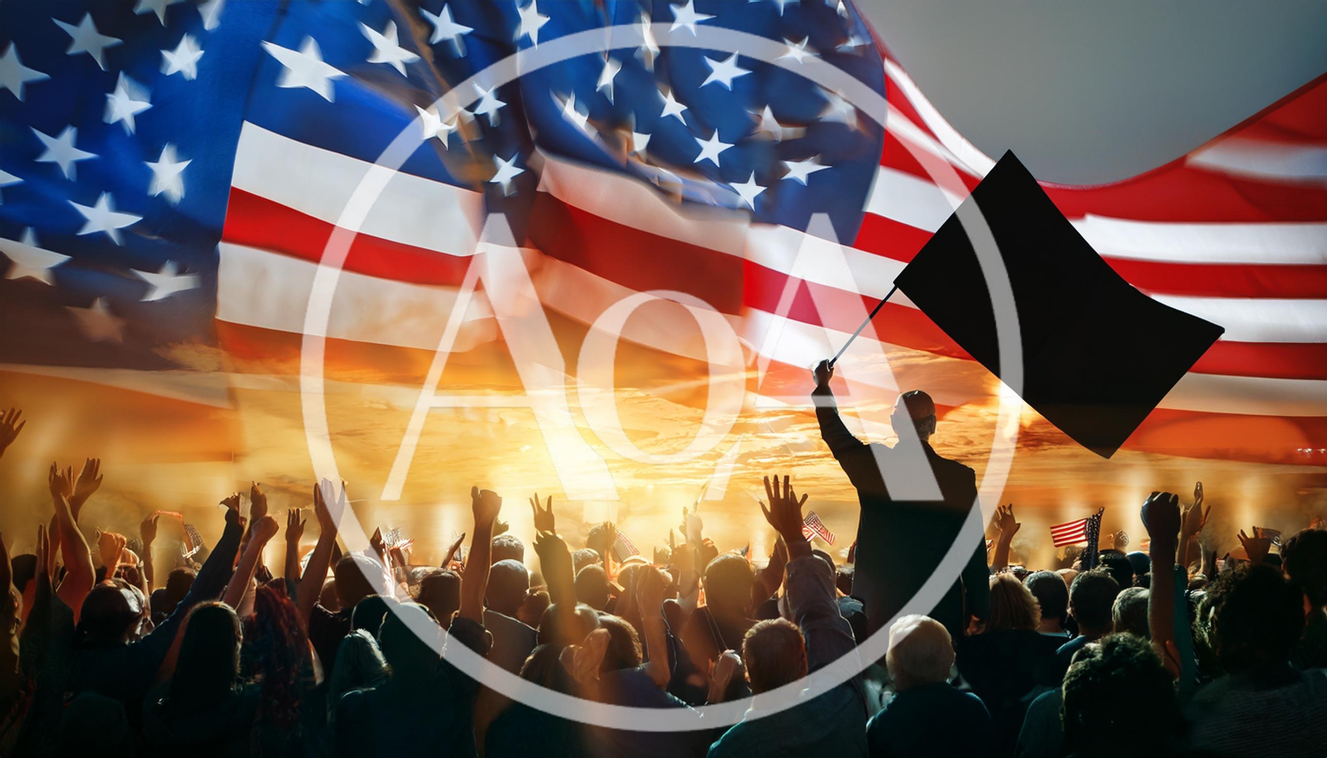 Crowd Cheering Before A Large American Flag