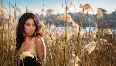 Portrait Of A Beautiful Woman In Tall Grass