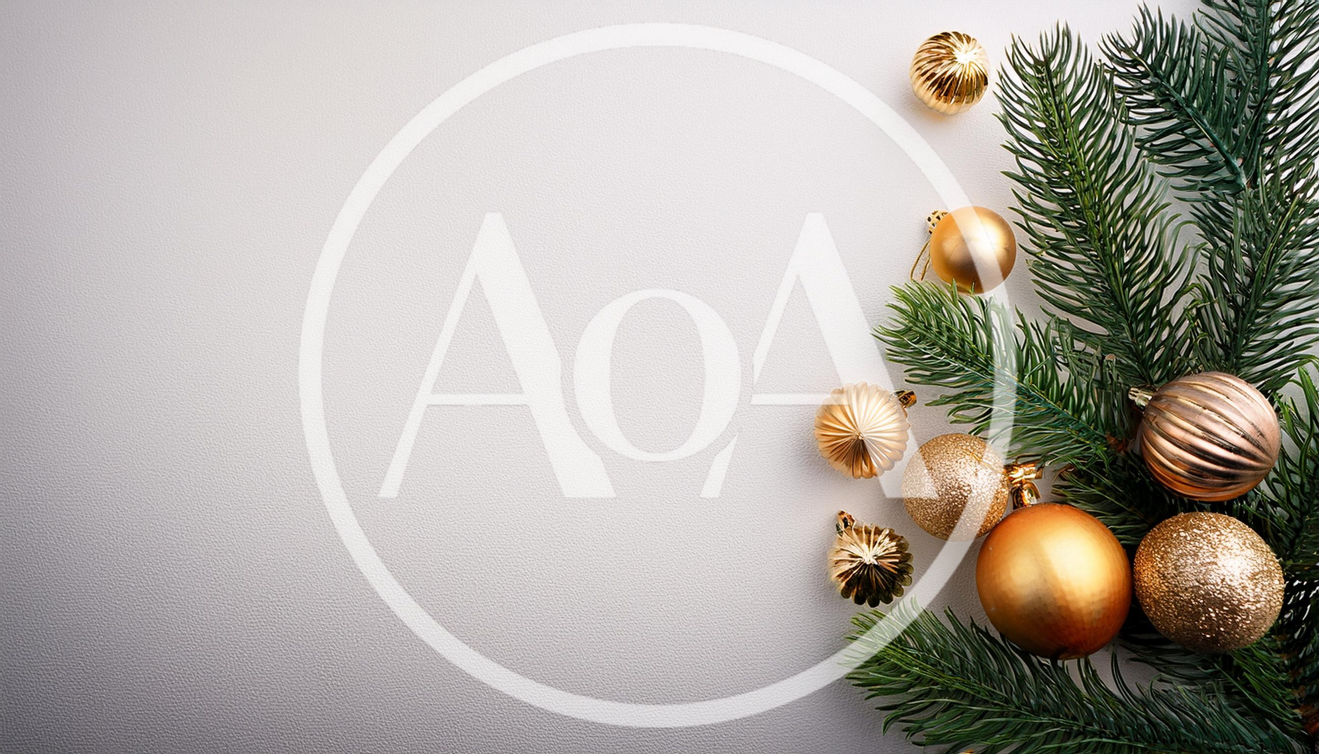 Golden Christmas Ornaments On Pine Branches