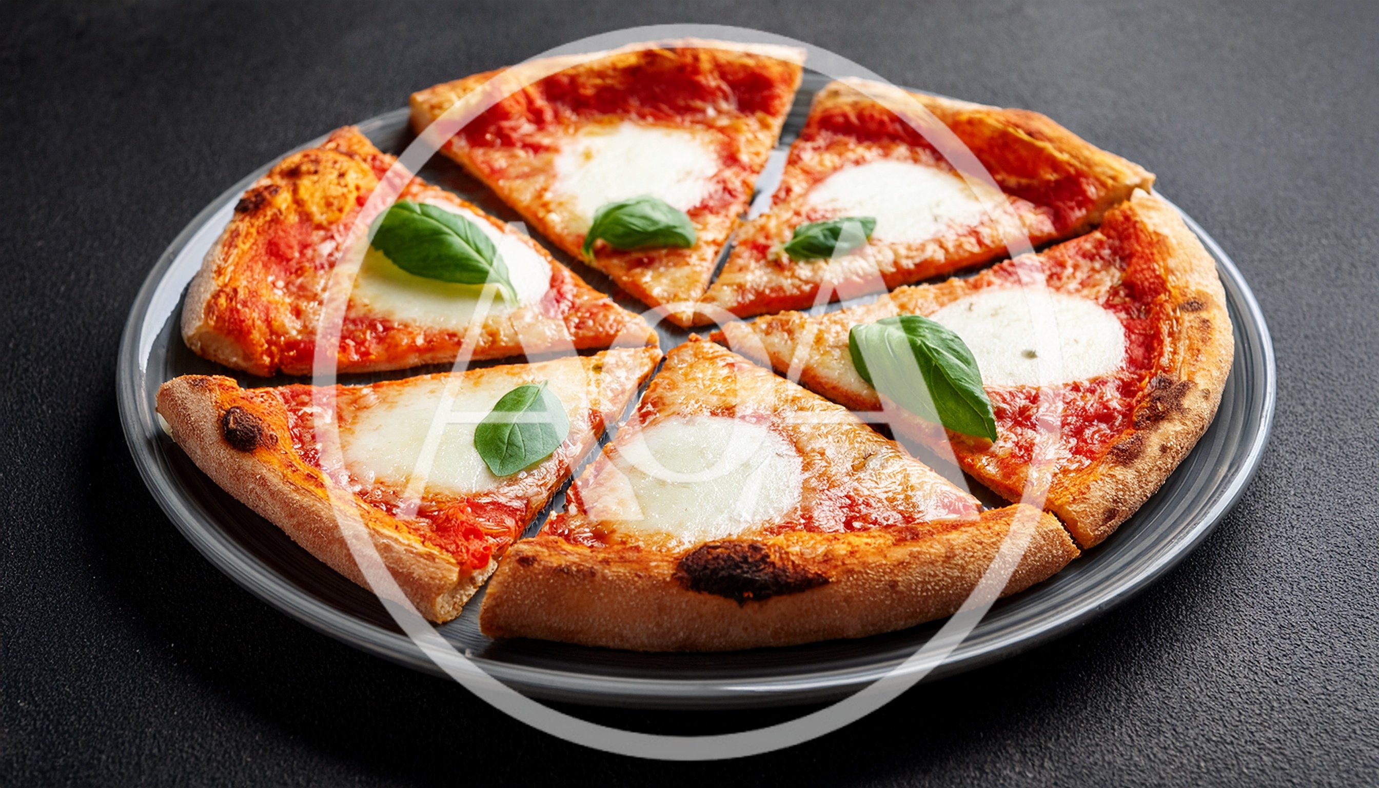 Fresh Margherita Pizza Slices On A Grey Plate