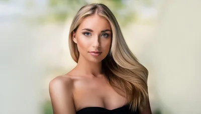 Portrait Of A Beautiful Blonde Woman With Long Hair