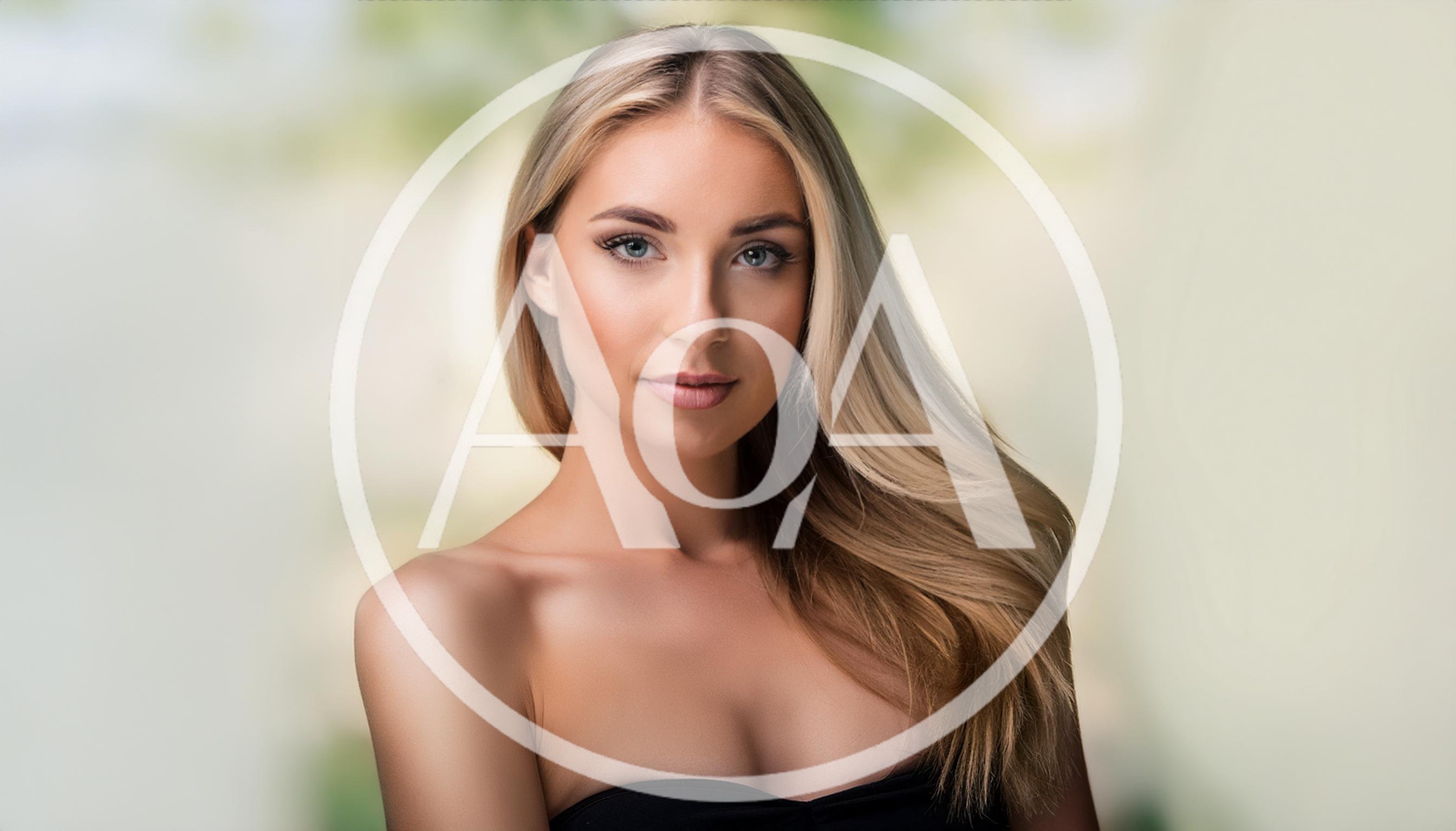 Portrait Of A Beautiful Blonde Woman With Long Hair