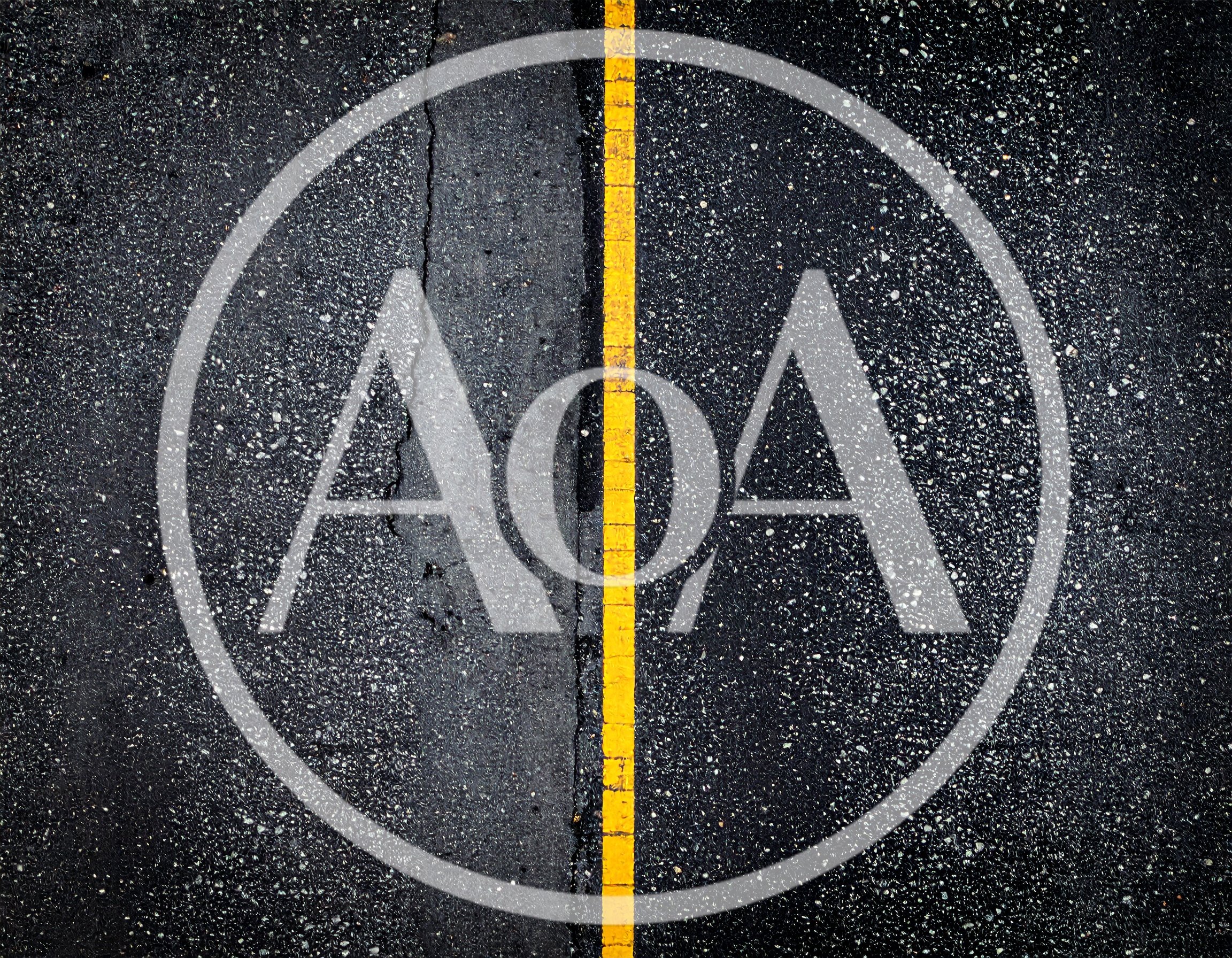Top Down View Of Wet Asphalt Road With Yellow Line