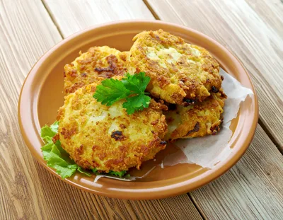 Crispy Potato Pancakes Served On A Plate
