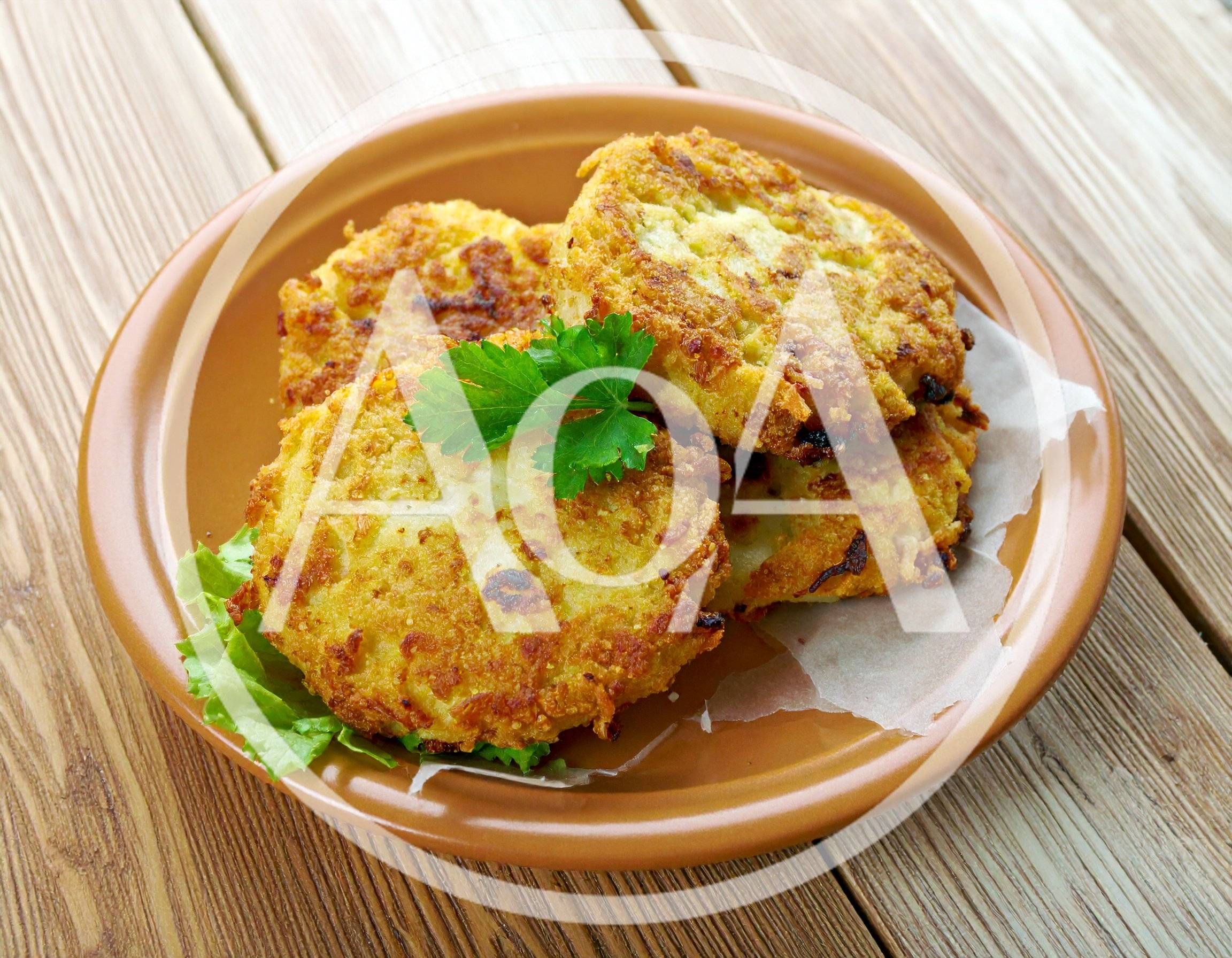 Crispy Potato Pancakes Served On A Plate