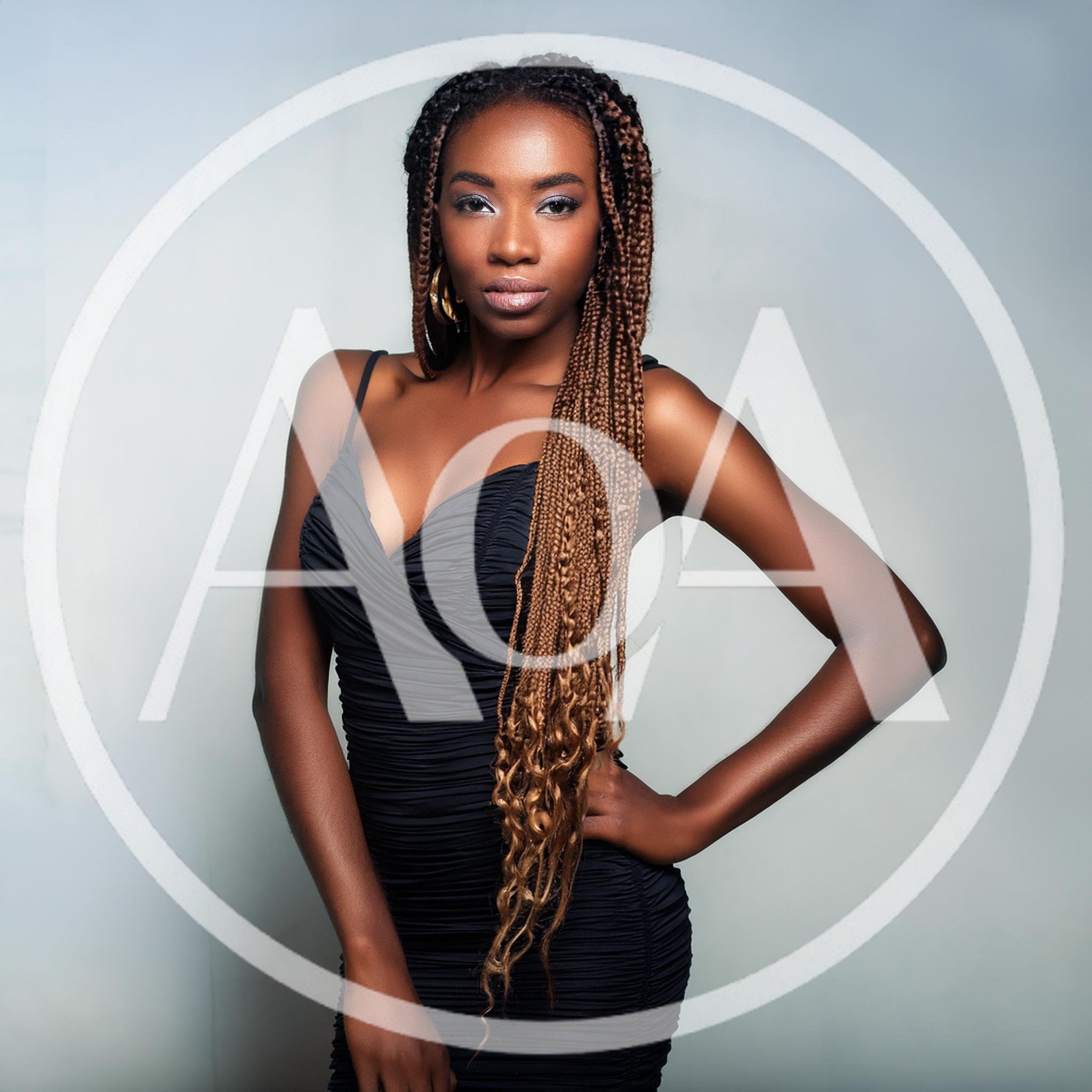 Portrait Of A Confident Woman In A Black Dress