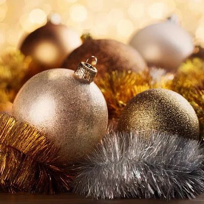 Golden Christmas Ornaments With Tinsel Decorations
