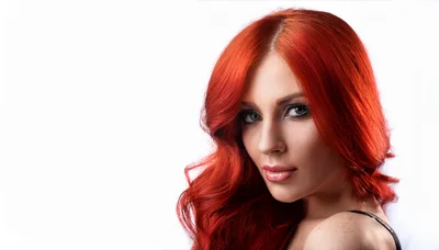 Portrait Of A Beautiful Woman With Vibrant Red Hair