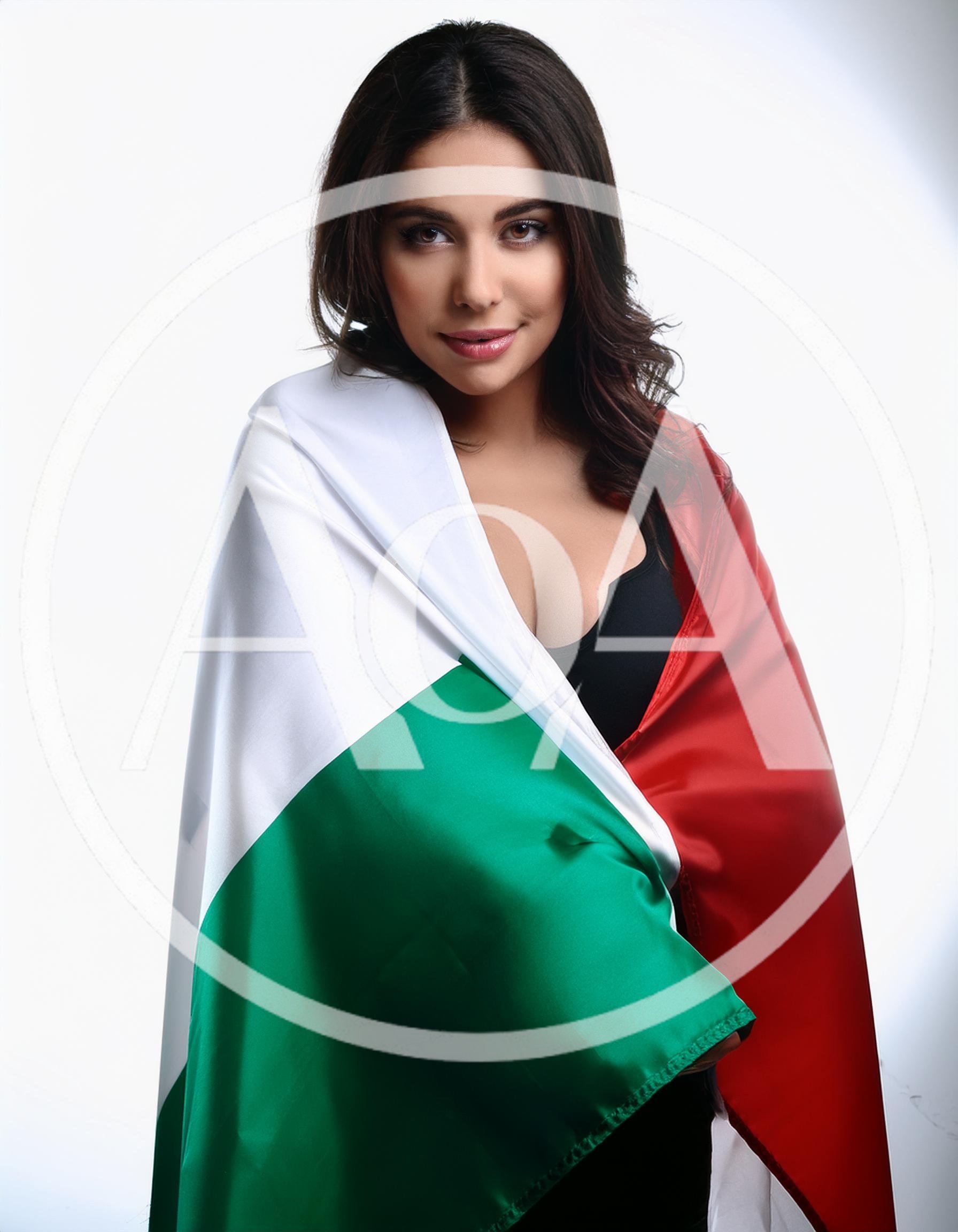 Young Woman Wrapped In An Italian Flag