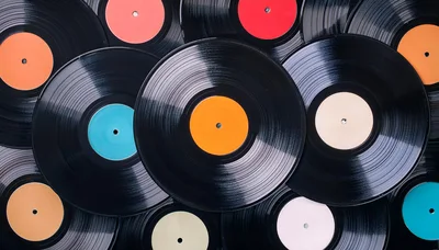 Collection Of Vintage Vinyl Records With Colorful Labels