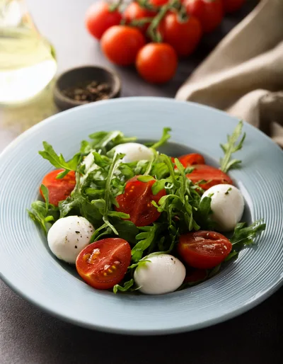 Fresh Caprese Salad With Arugula And Mozzarella