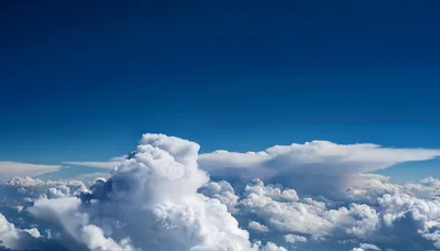 Aerial View Of Cumulus Clouds Above The Horizon